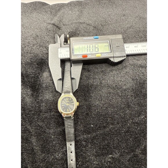 Vtg Timex Ladies Oval Watch: Black face,Black Leather Band Gold/Silver Tone Case - Picture 12 of 12
